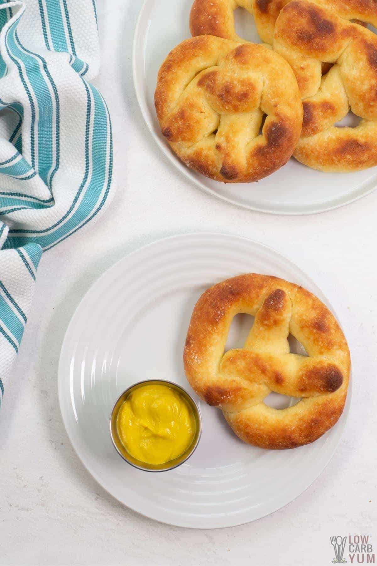 serving soft pretzels with mustard.